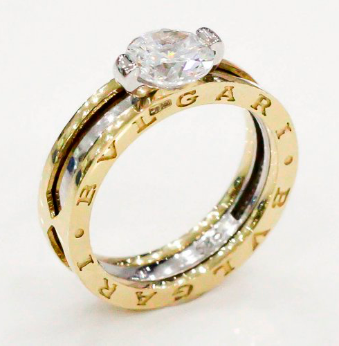 Кольцо из комбинированного золота с фианитами Ювелирное изделие - Кольцо из комбинированного золота с фианитами в магазине Best-Gold 065815